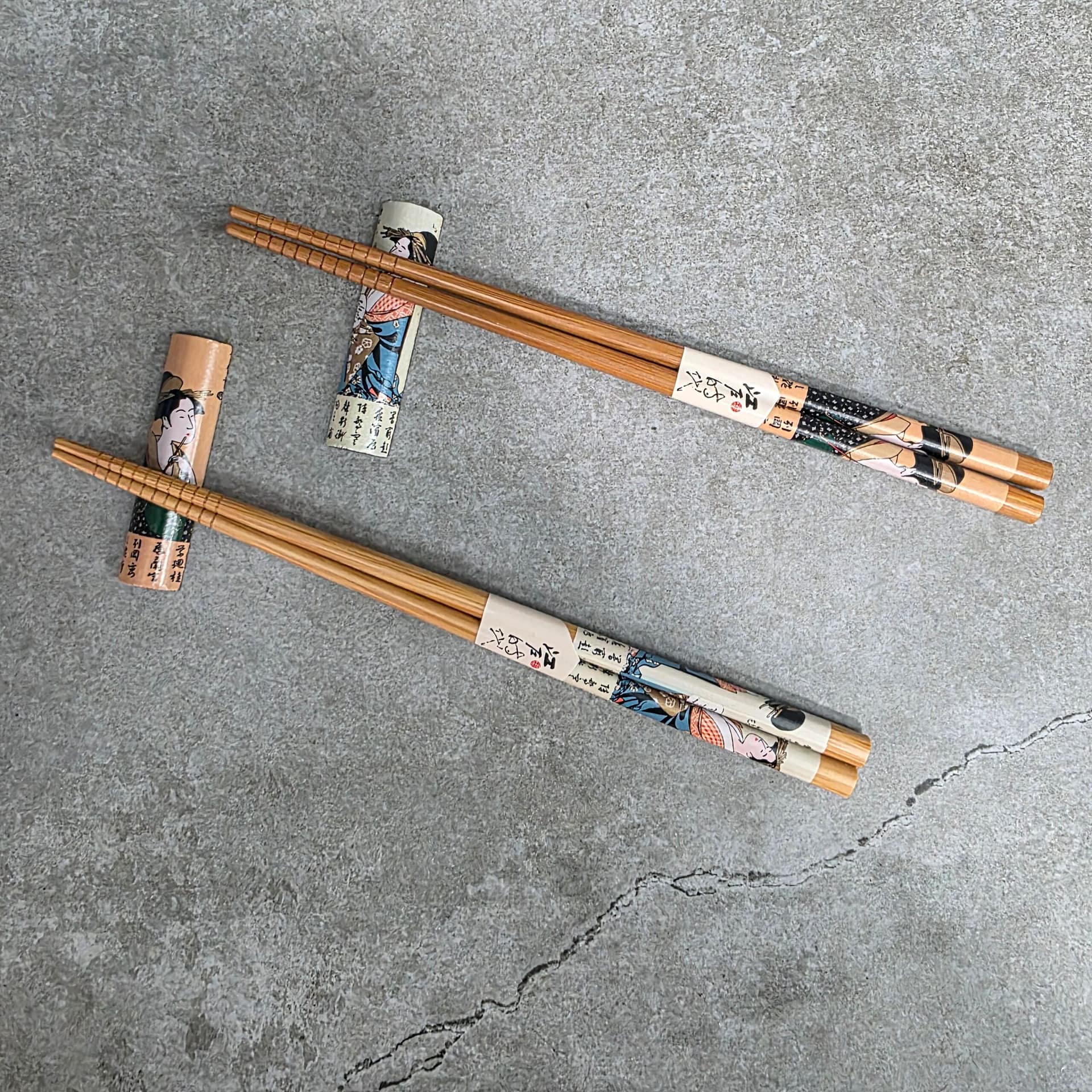 Juego de palillos y soporte para geisha