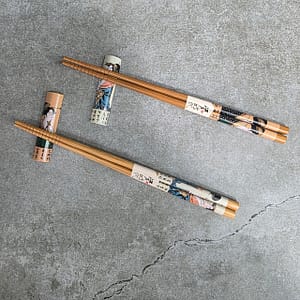 Juego de palillos y soporte para geisha